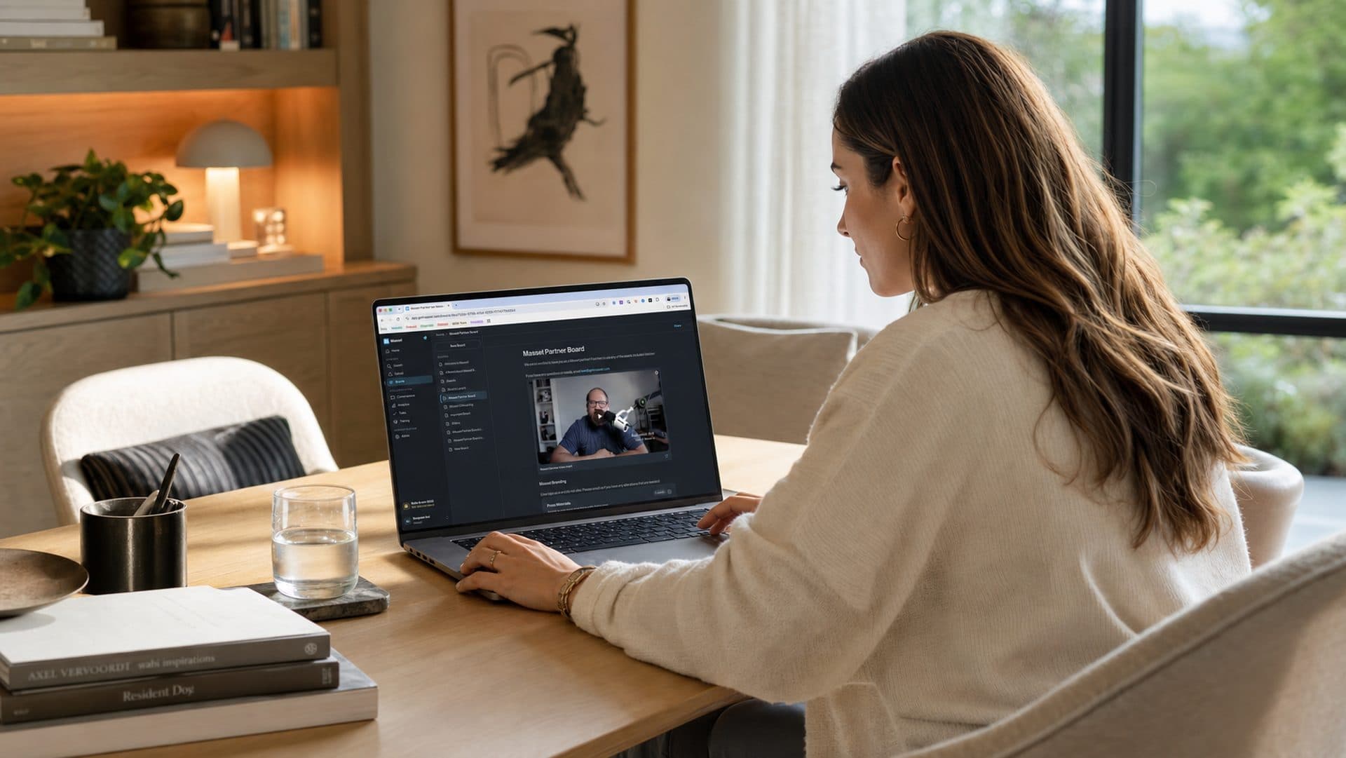 A marketer working from home with a Masset board open on her MacBook